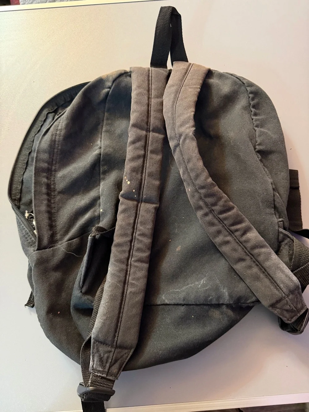 Vans Black Canvas Backpack with Red Lettering and Patch Accents